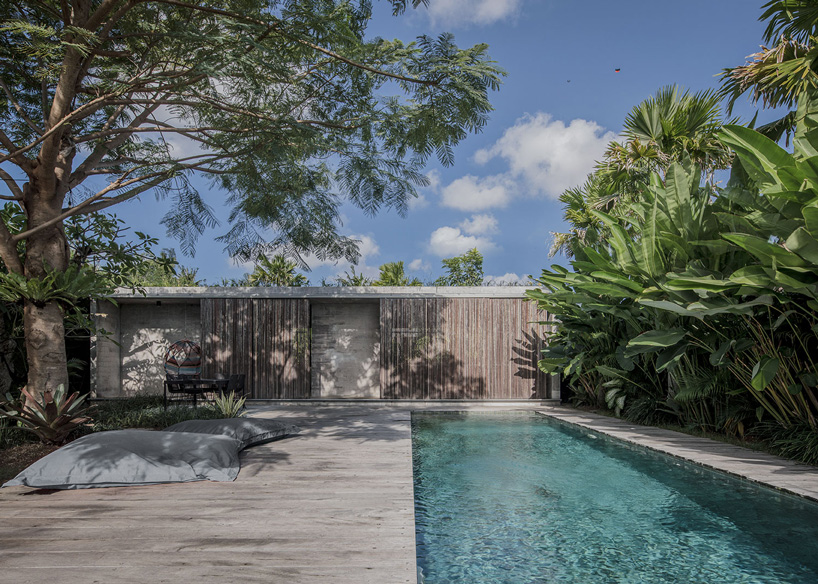 caceres + tous' 'house BK' view of the garden with pool