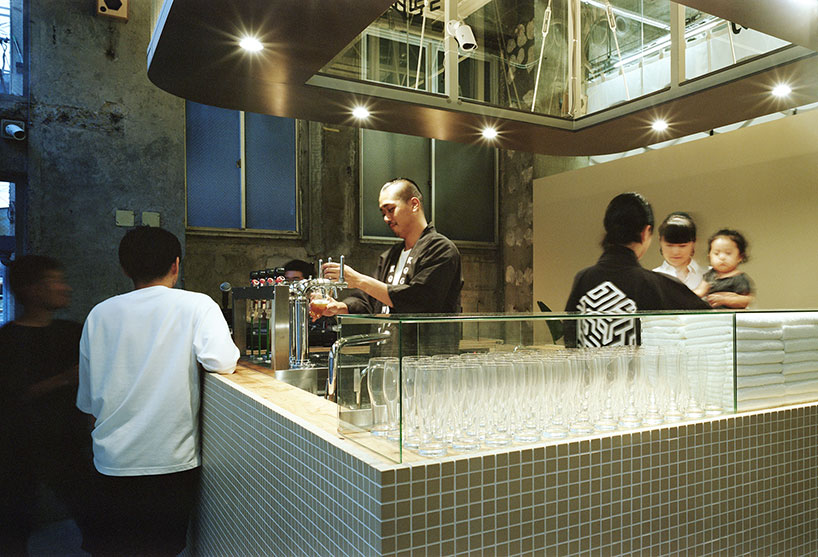 schemata architects completes bold renovation of old public bathhouse in tokyo