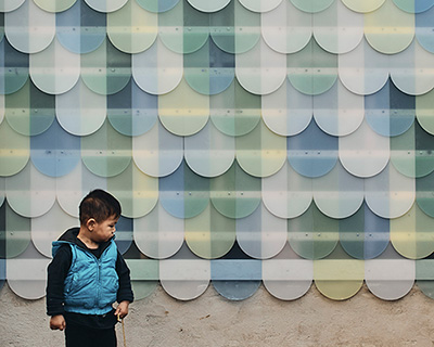 krisna cheung adds pastel-colored perspex shingles façade to a studio garage in melbourne