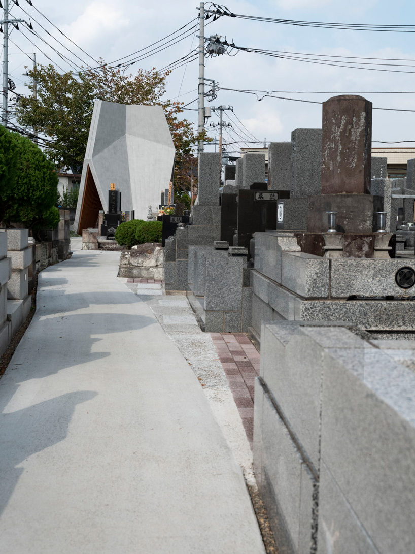 love architecture adds concrete + wood hall for tree burials to new cemetery in japan