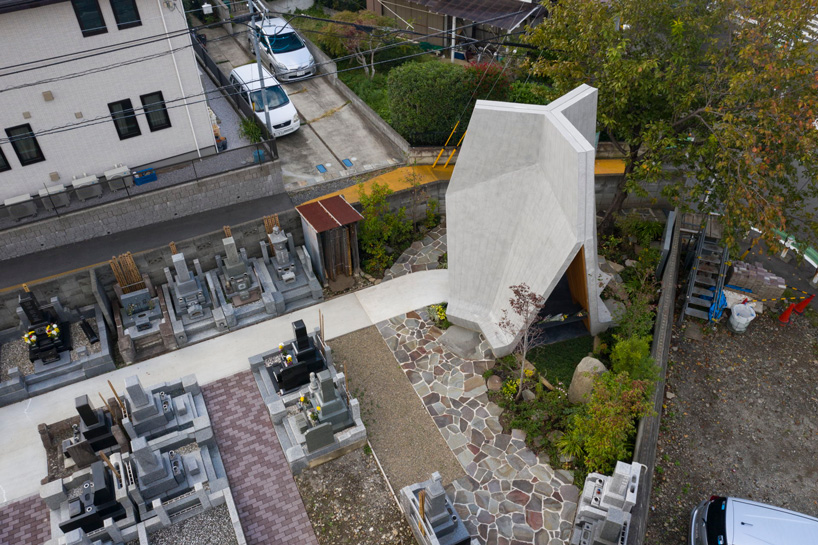 love architecture adds concrete + wood hall for tree burials to new cemetery in japan