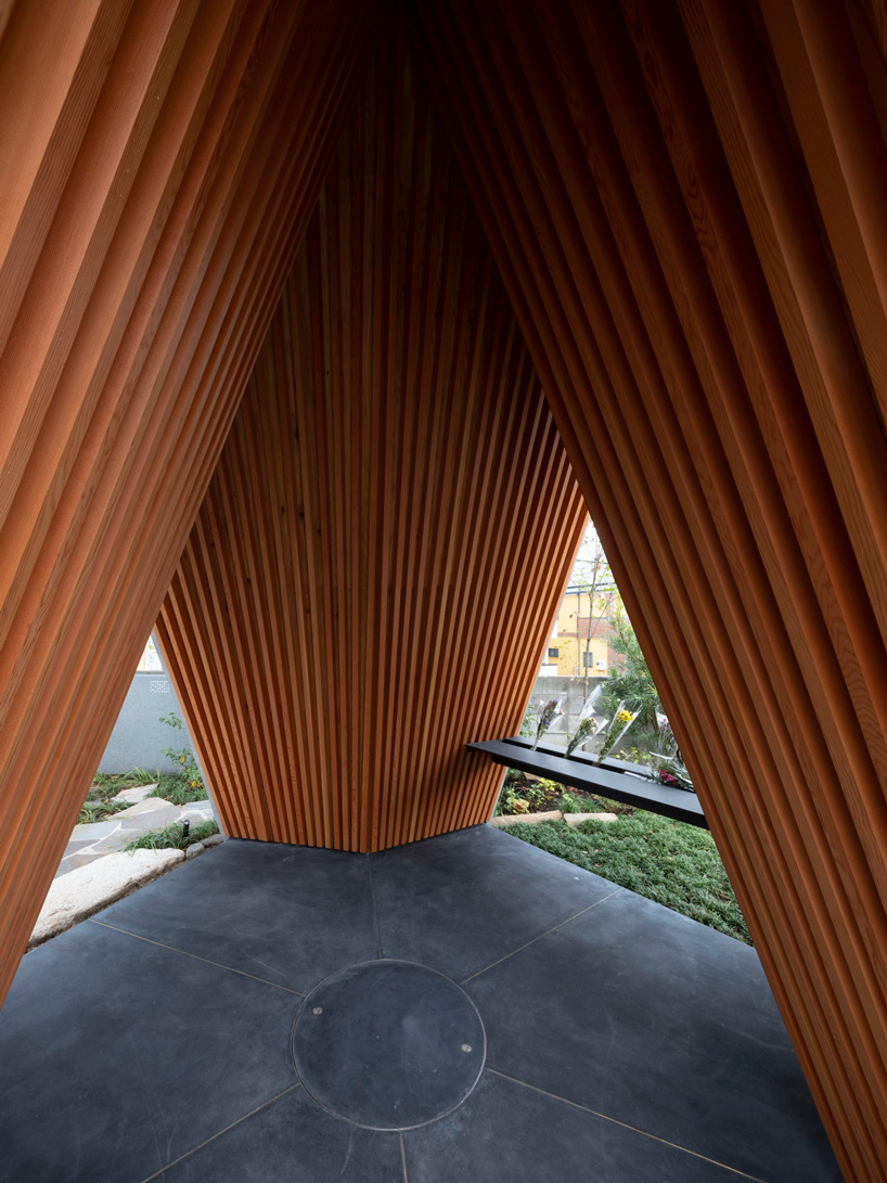 love architecture adds concrete + wood hall for tree burials to new cemetery in japan