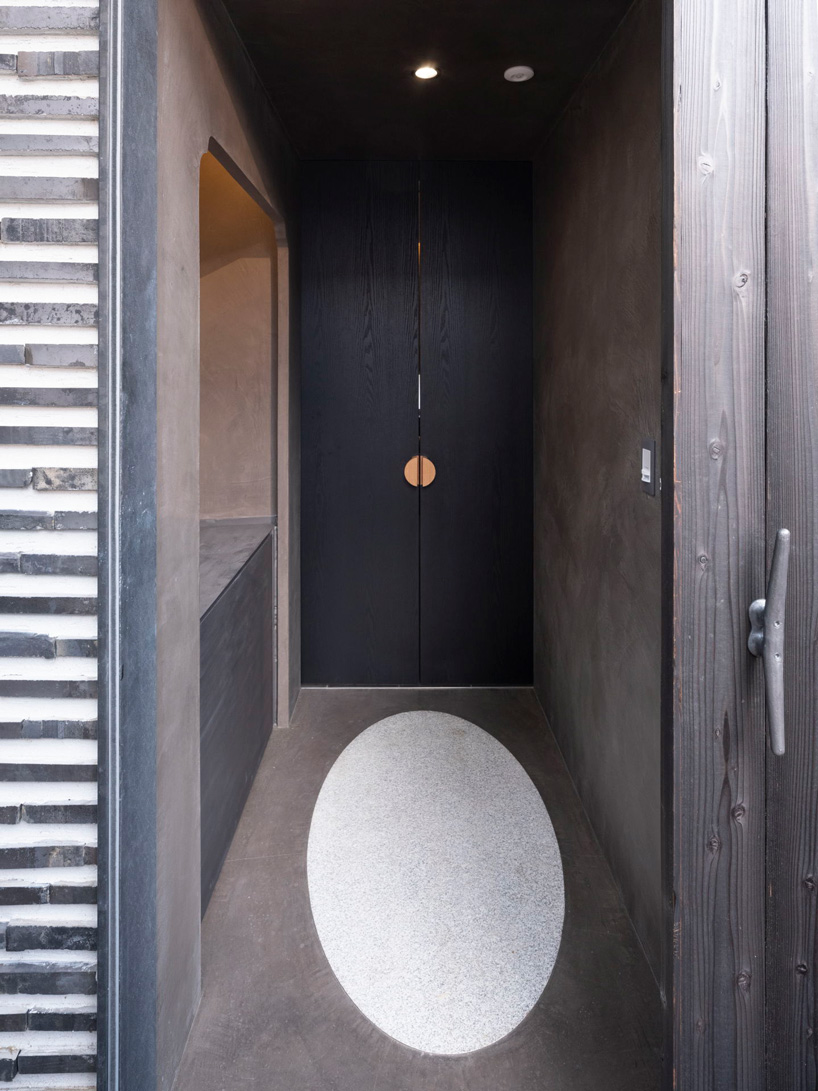 love architecture adds concrete + wood hall for tree burials to new cemetery in japan