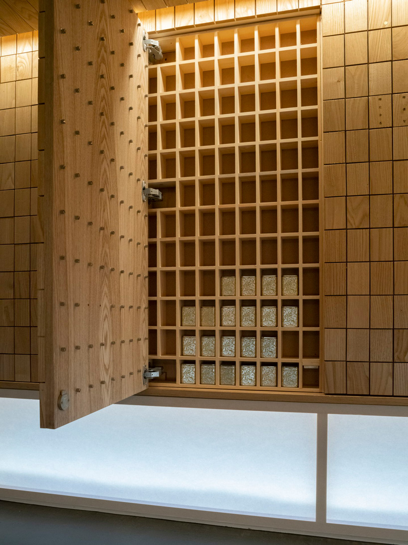 love architecture adds concrete + wood hall for tree burials to new cemetery in japan