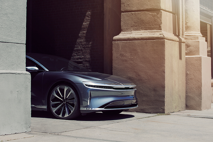 lucid air is a 500mile range electric sedan that charges in minutes