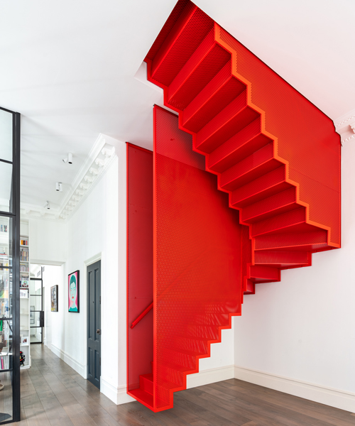 michaelis boyd intervenes georgian apartment in london with floating red staircase