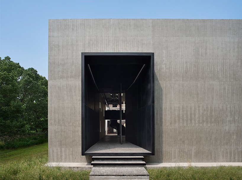 bamboo louvers clad this factory turned gallery by mitsuhiro shoji in zhejiang, china