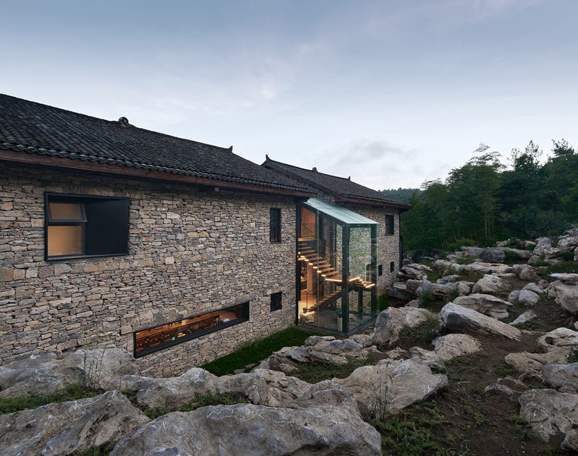 nanchawan·shiwu tribe homestay nestles into a mountain village in china designboom