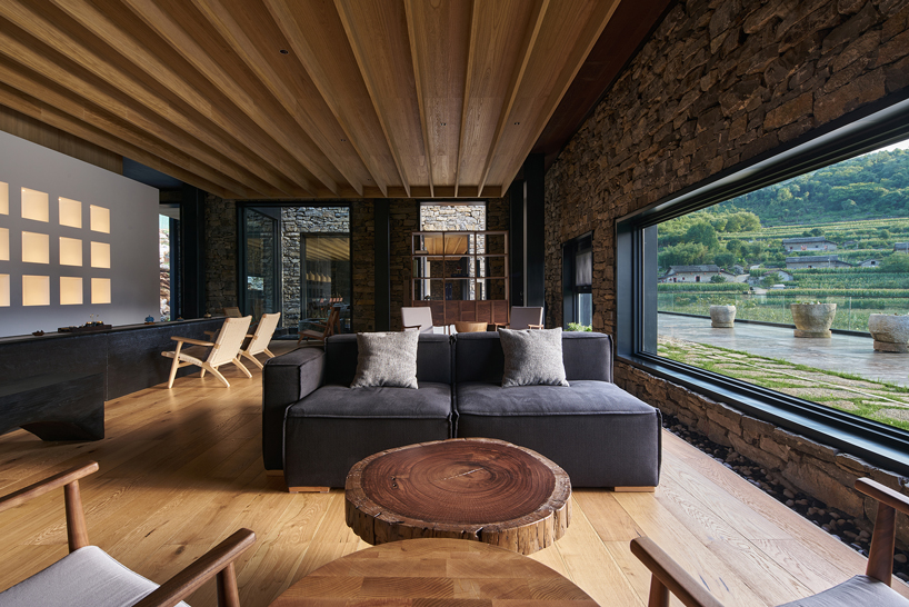 nanchawan·shiwu tribe homestay nestles into a mountain village in china designboom