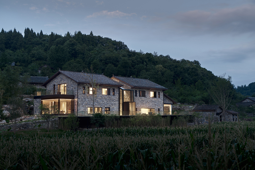 nanchawan·shiwu tribe homestay nestles into a mountain village in china designboom