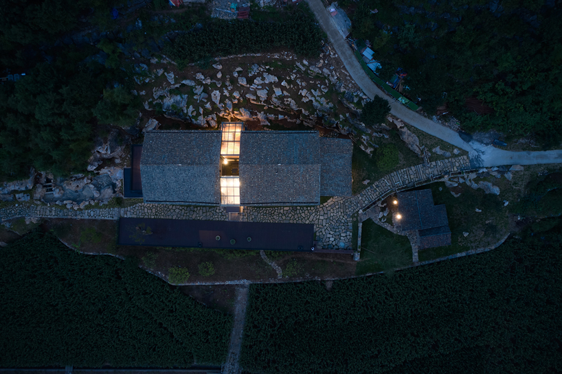nanchawan·shiwu tribe homestay nestles into a mountain village in china designboom