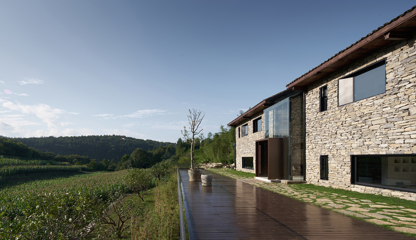 nanchawan·shiwu tribe homestay nestles into a mountain village in china designboom