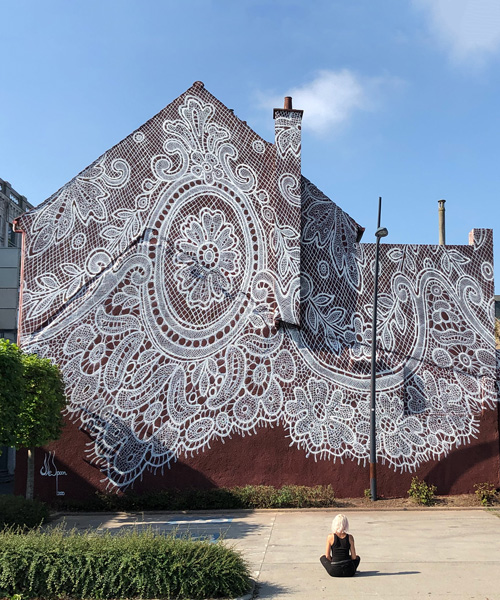 nespoon's giant lace mural in calais, france, pays tribute to the city's unique history