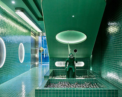 PIG design's public washroom interior in china reminds of space exploration scenes