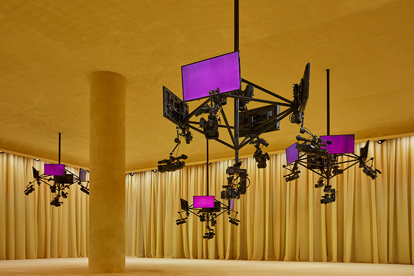 OMA/AMO designs yellow, intimate and tactile space for prada's SS21 virtual show