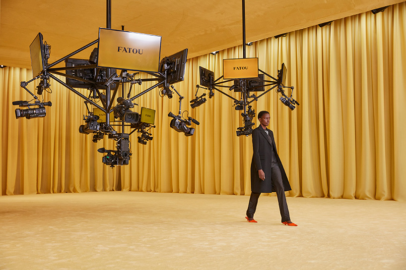 OMA/AMO designs yellow, intimate and tactile space for prada's SS21 virtual show