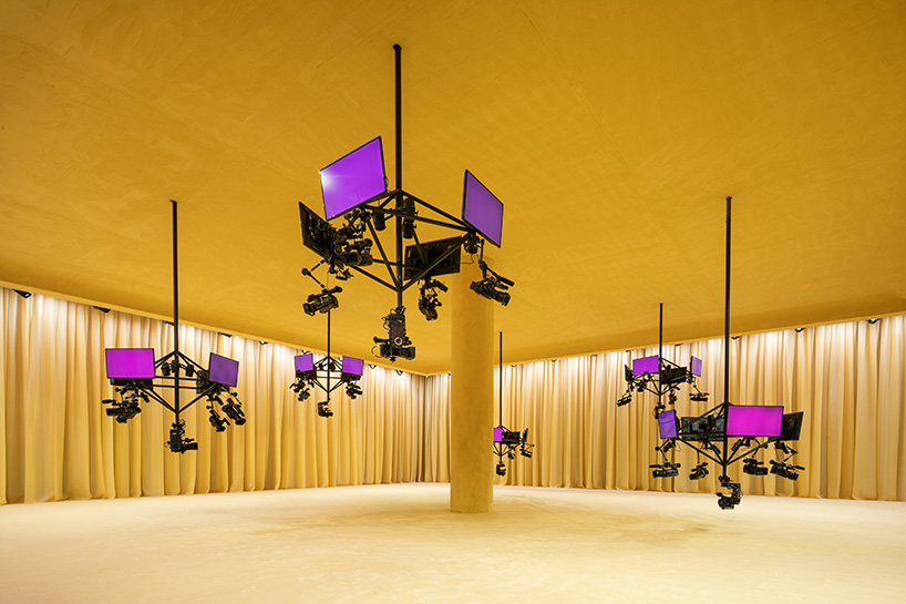 OMA/AMO designs yellow, intimate and tactile space for prada's SS21 virtual show
