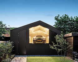 private car showroom by bureau fraai in amsterdam frames views of iconic jaguar models