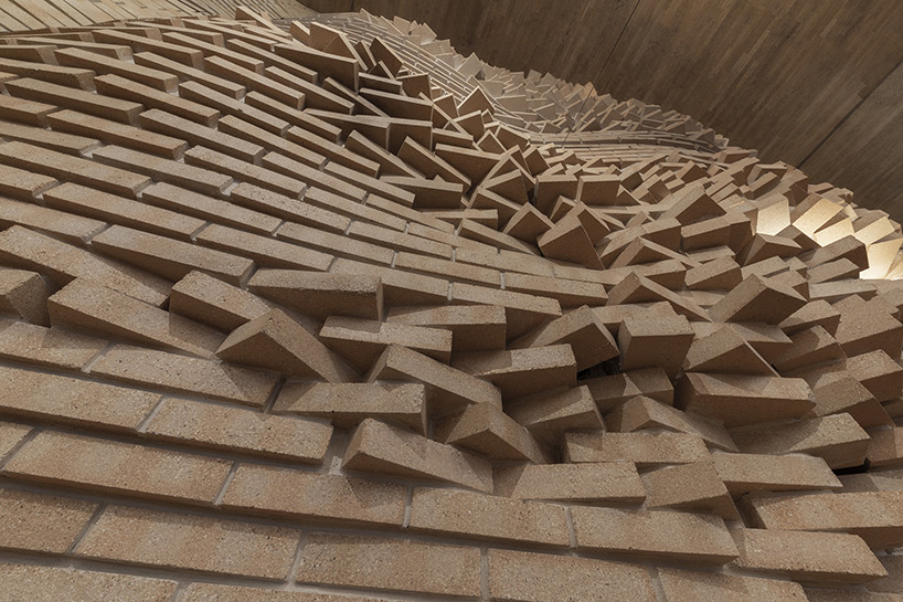 malka architecture 'explodes' brick backdrop to le paname comedy club in paris