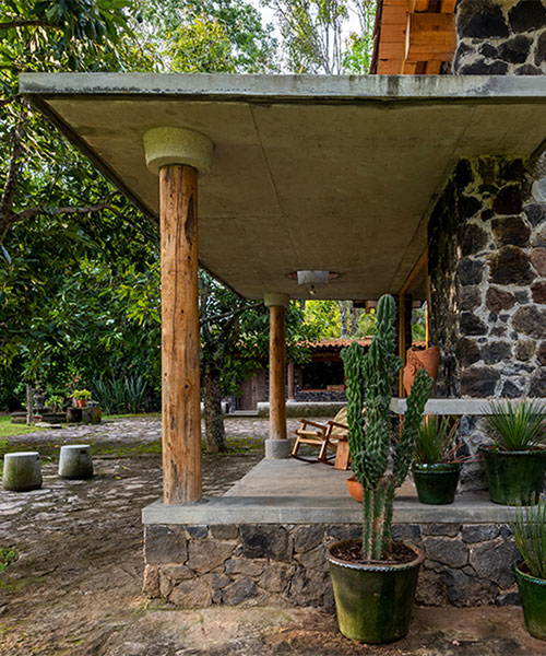 stone, adobe, and concrete form country house by luis carbonell in mexico