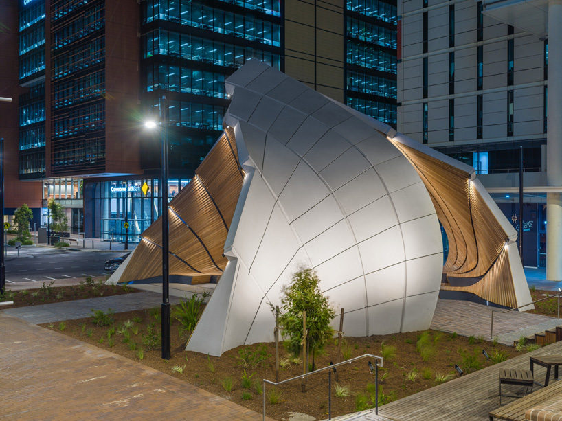 interchanging rail tracks define this sculptural pavilion by studio chris fox in sydney