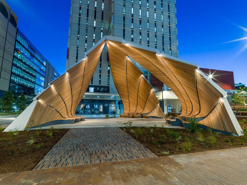 interchanging rail tracks define this sculptural pavilion by studio chris fox in sydney