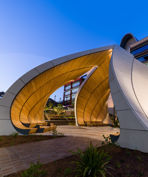 interchanging rail tracks define this sculptural pavilion by studio chris fox in sydney