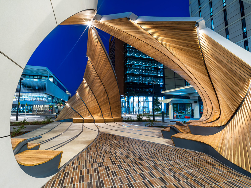 interchanging rail tracks define this sculptural pavilion by studio chris fox in sydney