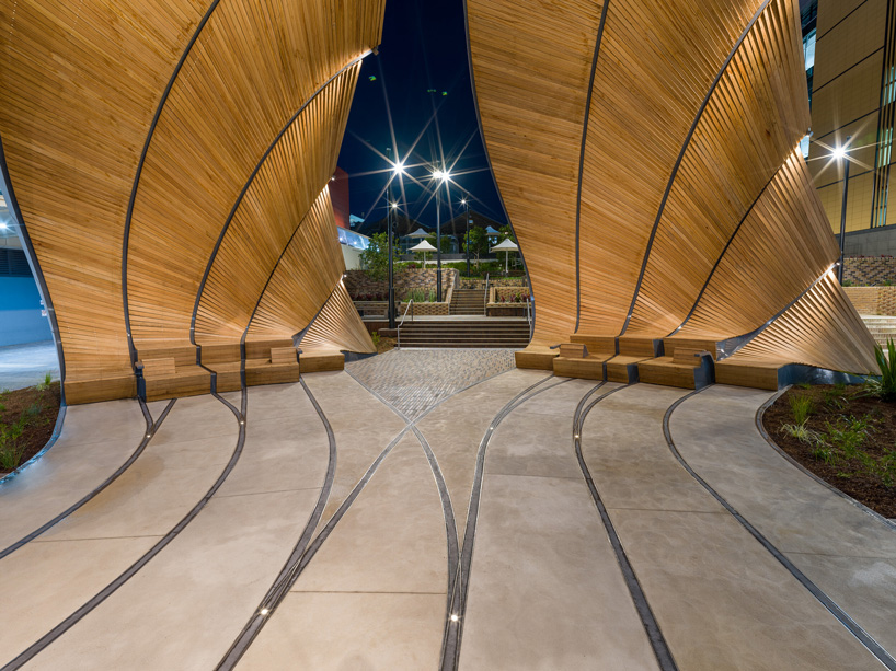interchanging rail tracks define this sculptural pavilion by studio chris fox in sydney