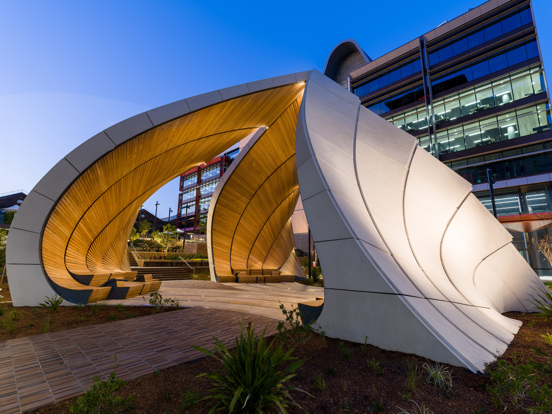 interchanging rail tracks define this sculptural pavilion by studio chris fox in sydney