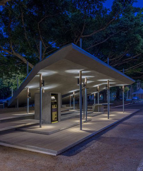 sturdy inclined roof and slim steel columns build university campus bus-stop in taiwan