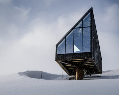 A38 arkitekter's minimal diamanten cabin floats above mountainside of oppdal, norway