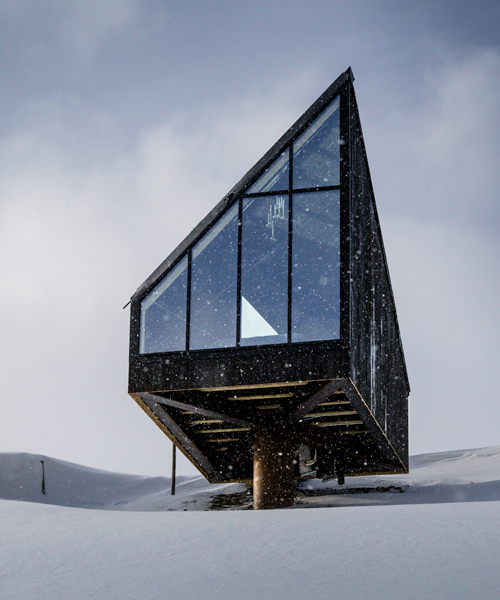 A38 arkitekter's minimal diamanten cabin floats above mountainside of oppdal, norway