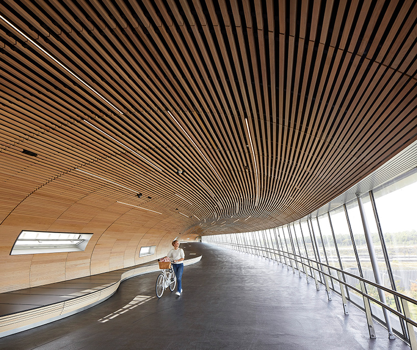 COBE's snake-like 'køge nord station' in denmark documented by hufton + crow