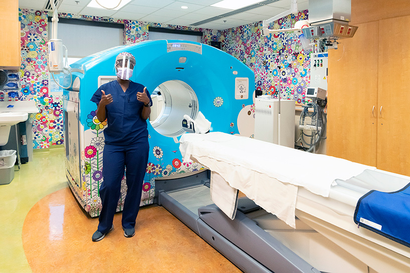 takashi murakami wraps a CT/PET scan suite at children’s hospital with signature flowers