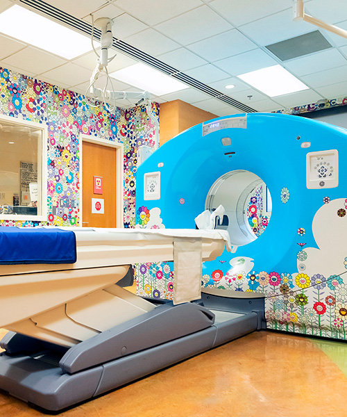 takashi murakami wraps a CT/PET scan suite at children’s hospital with signature flowers