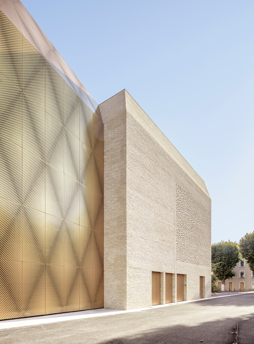 antonio virga architecte completes luminous, perforated cinema in cahors, france