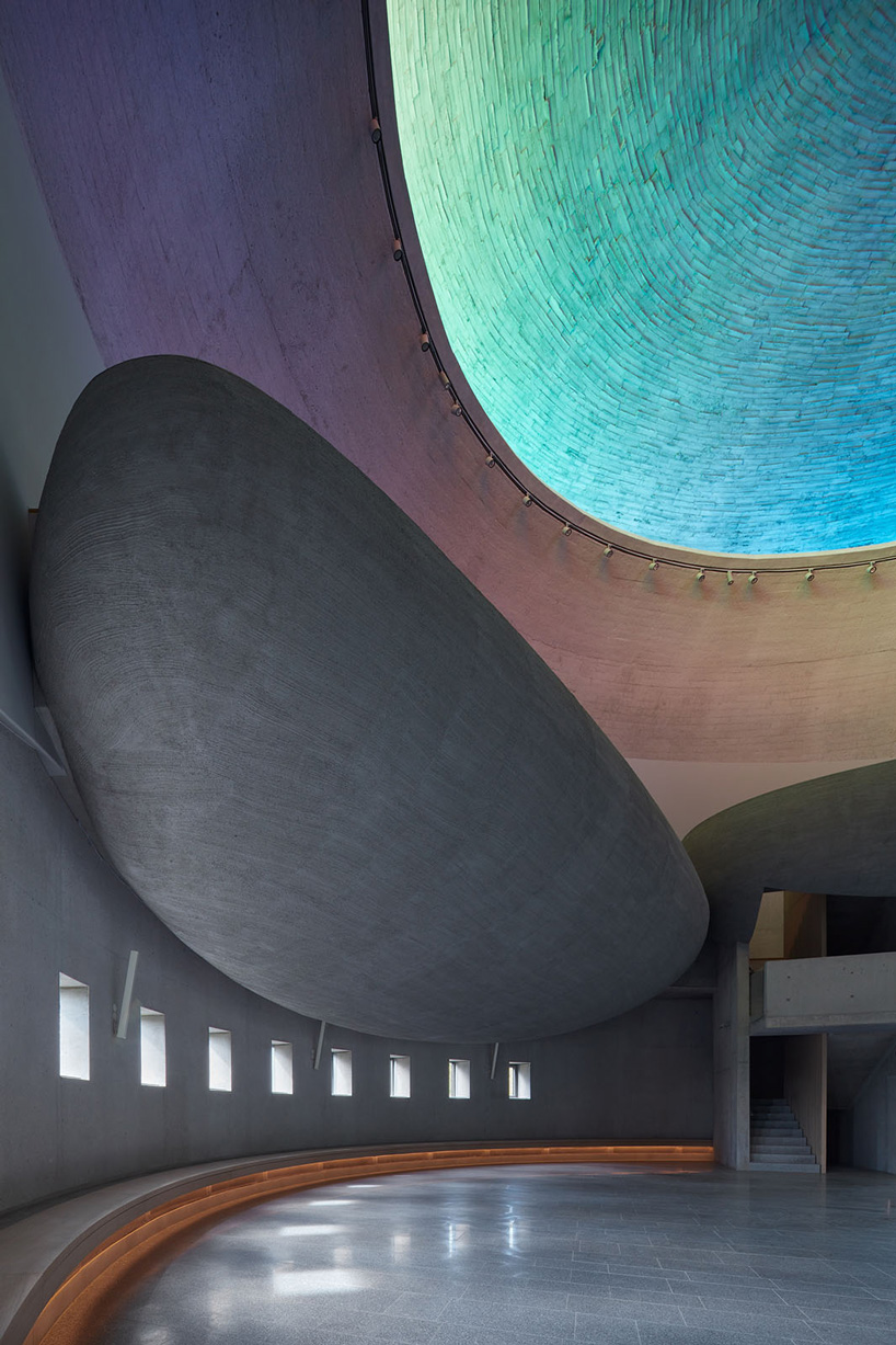 panoramic rainbow window tops atelier štepán's circular church in the czech republic