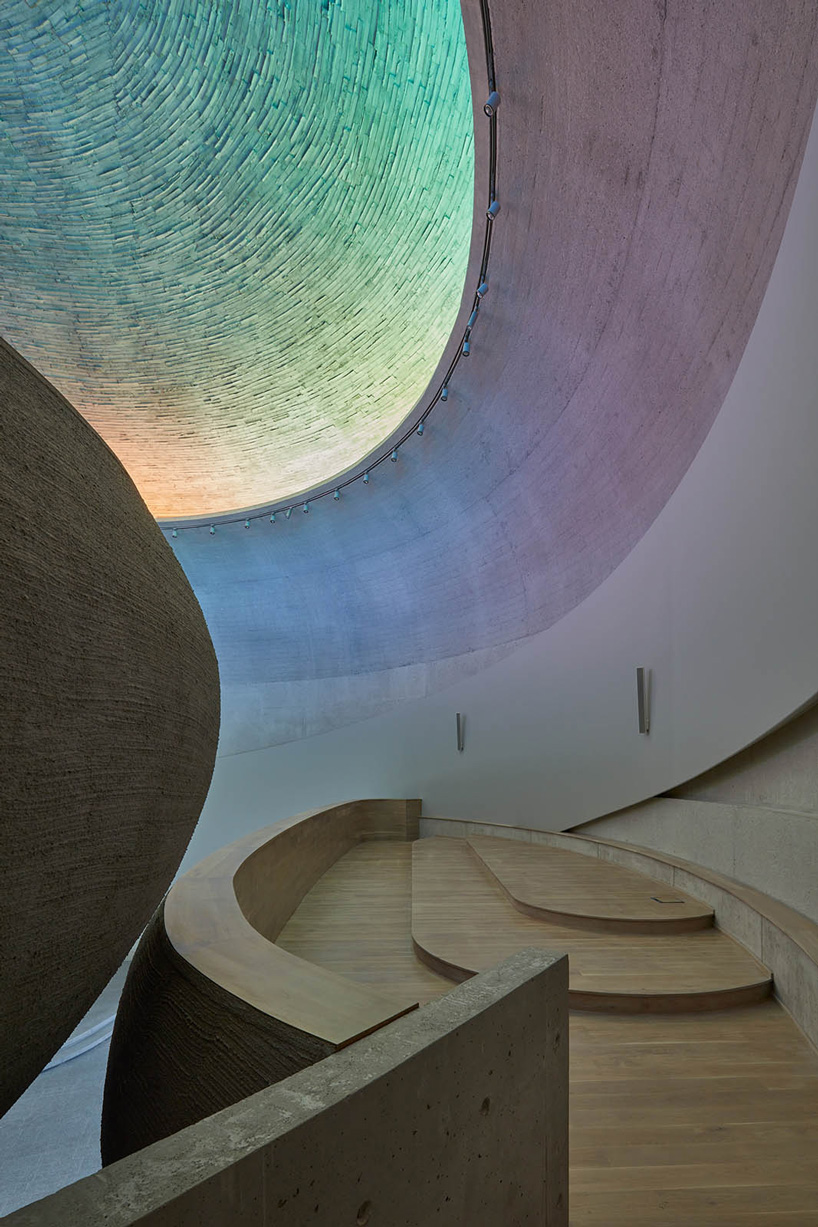 panoramic rainbow window tops atelier štepán's circular church in the czech republic