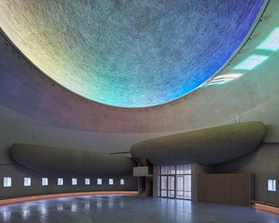 panoramic rainbow window tops atelier štepán's circular church in the czech republic