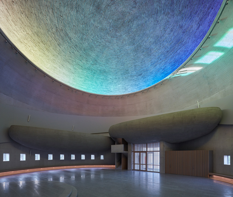 panoramic rainbow window tops atelier štepán's circular church in the czech republic