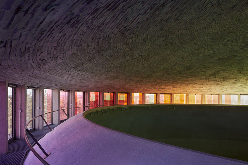 panoramic rainbow window tops atelier štepán's circular church in the czech republic