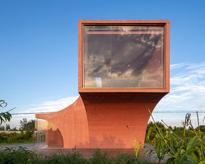 atelier xi builds sculptural 'peach hut' pavilion as part of community center in rural china