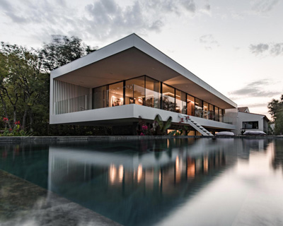 brengues le pavec adds mirror swimming pool to house extension in the south of france