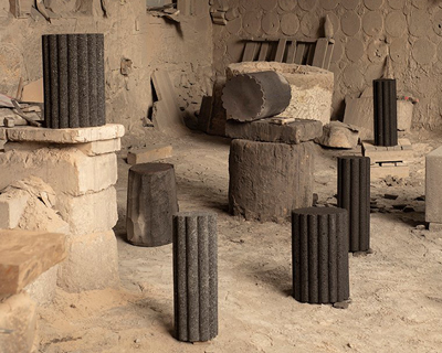 peca studio carves tables from volcanic rock for 'loto roca' collection