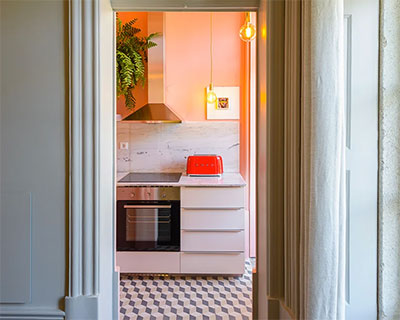 ESQVTA applies lively color palette to historic apartment renovation in portugal