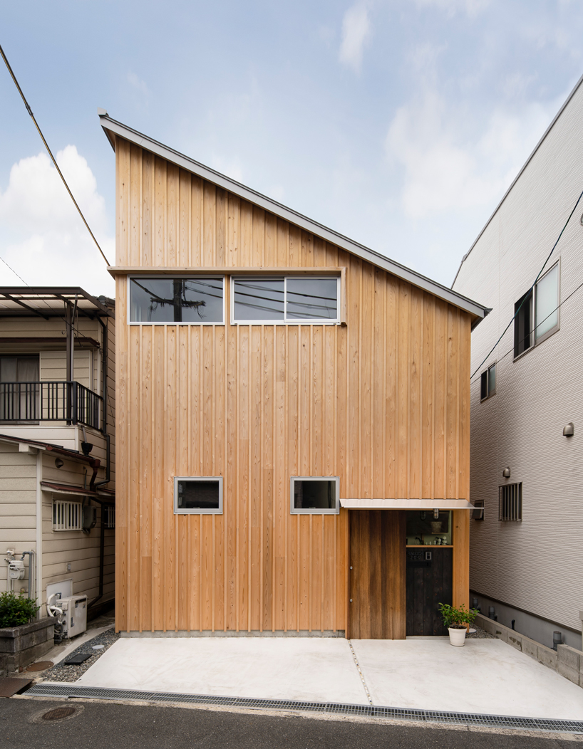 coil kazuteru matumura architects builds a climbing wall into 'F-house' in japan