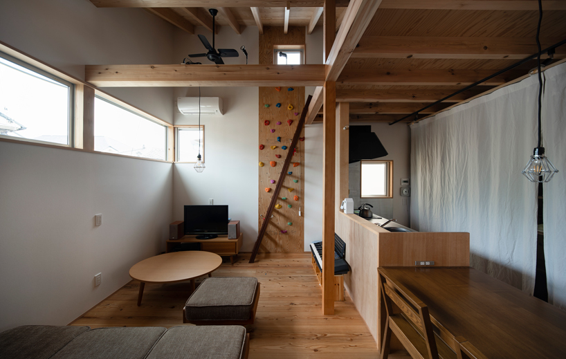 coil kazuteru matumura architects builds a climbing wall into 'F-house' in japan