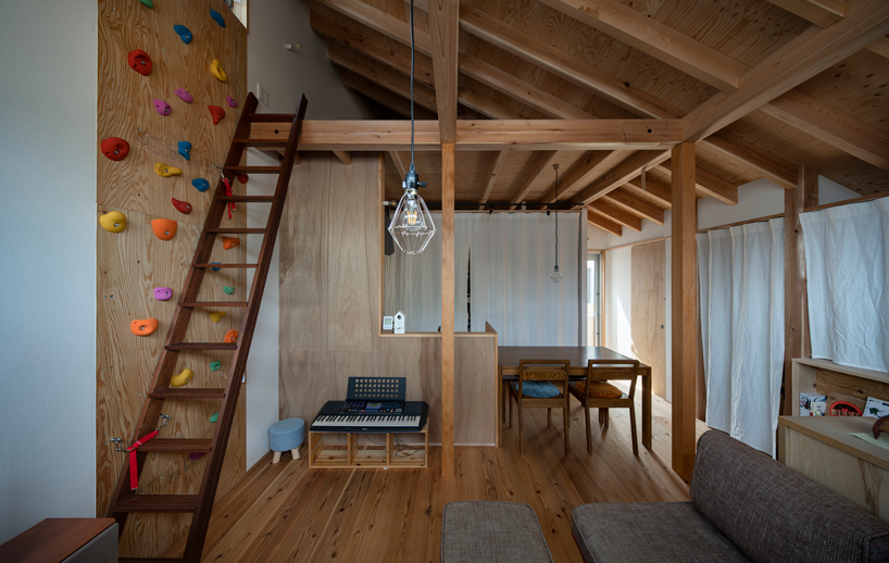 coil kazuteru matumura architects builds a climbing wall into 'F-house' in japan