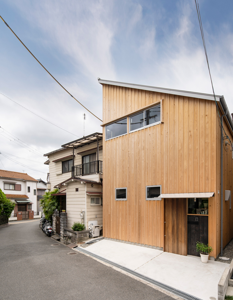 coil kazuteru matumura architects builds a climbing wall into 'F-house' in japan